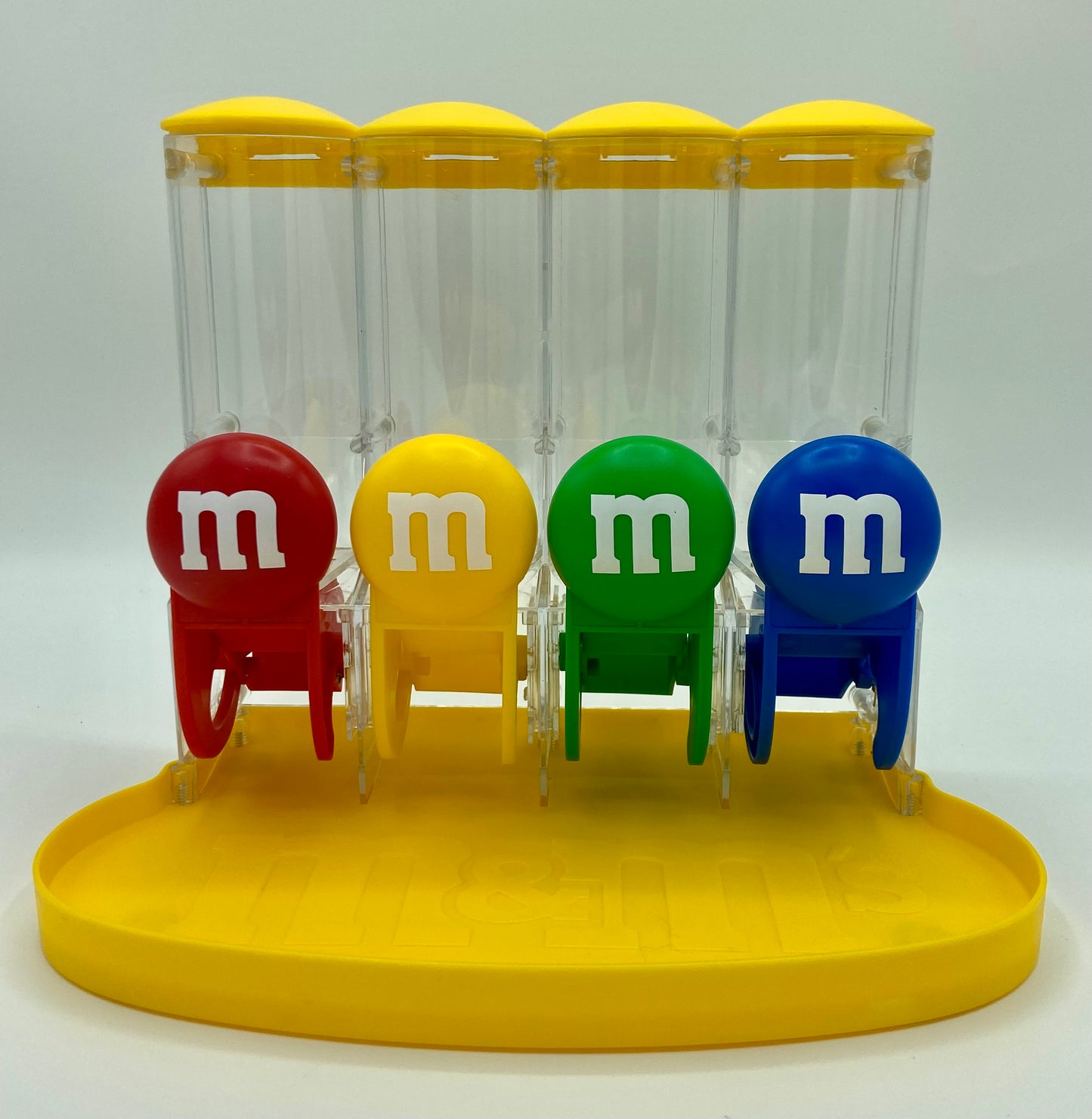 M&M's World Four Tube Yellow Candy Dispenser colors Red, Yellow, Green, Blue EUC